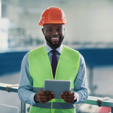 Smiing construction worker